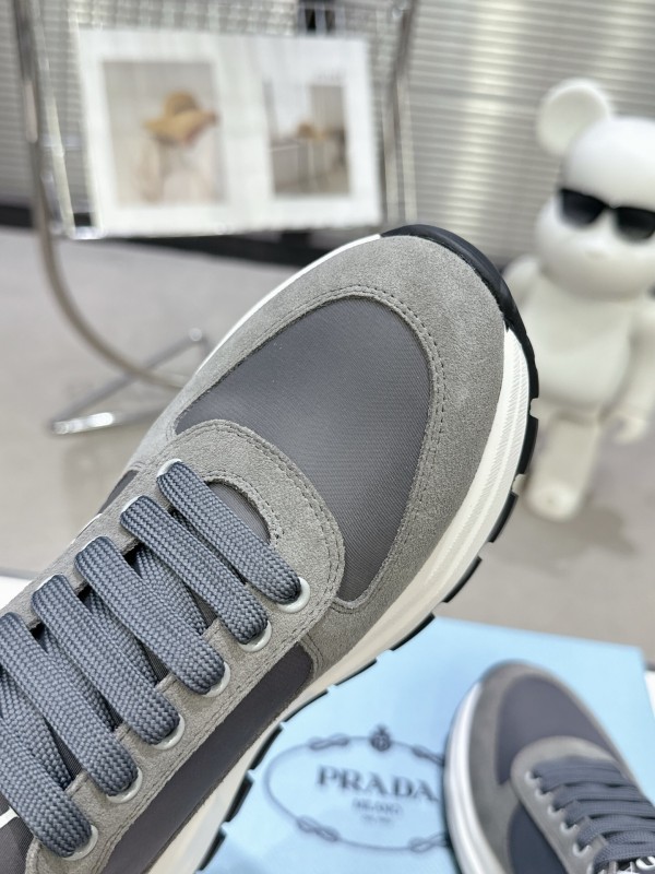 2025 Unisex Prada Grey Suede Leather Sneakers KFY00310